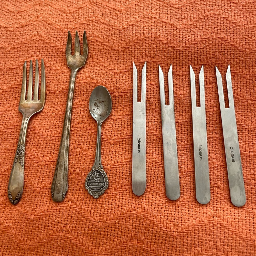 Source Unknown Silver and Brown Flatware Set
